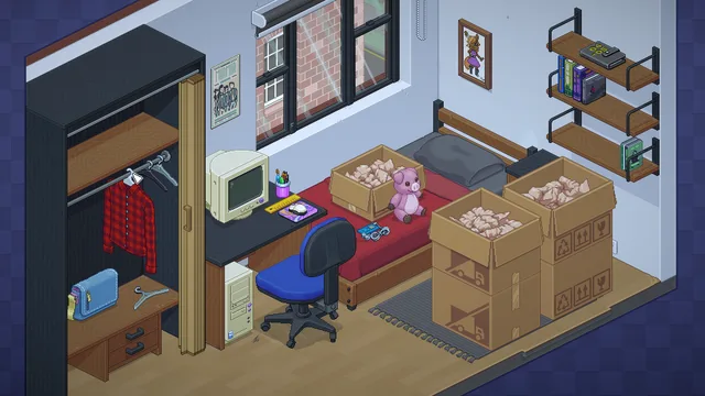 窓辺の机と本棚を備えた部屋に、開いた段ボール箱と赤い椅子が並ぶ。